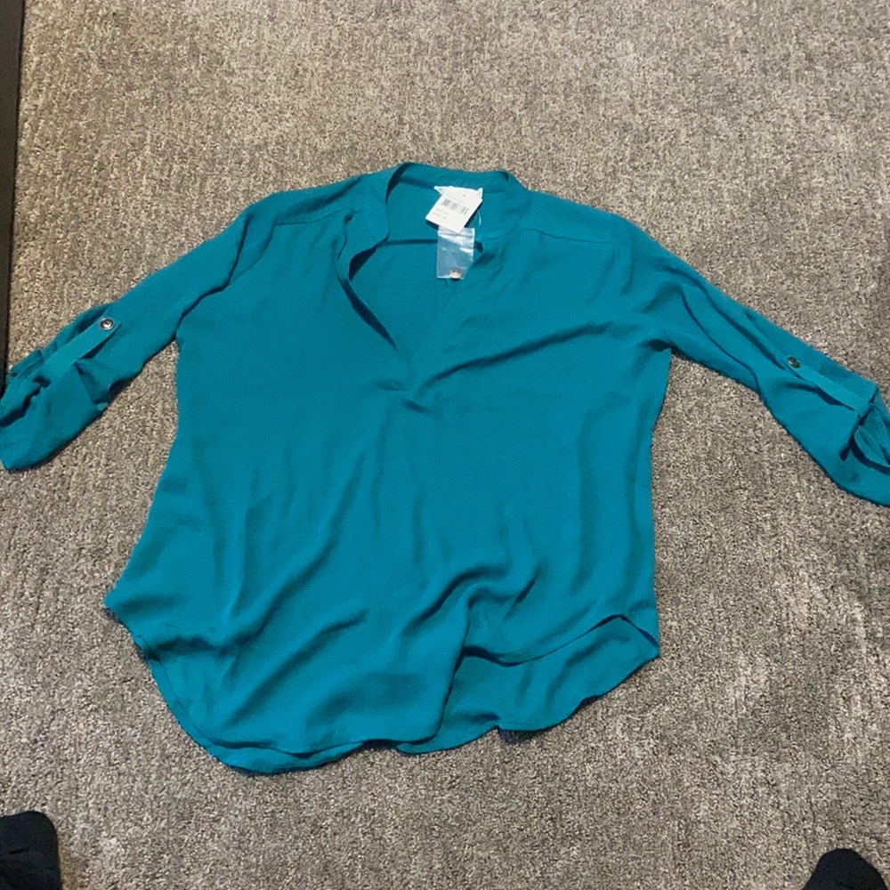 Green flowey top. Size Medium. Never worn.